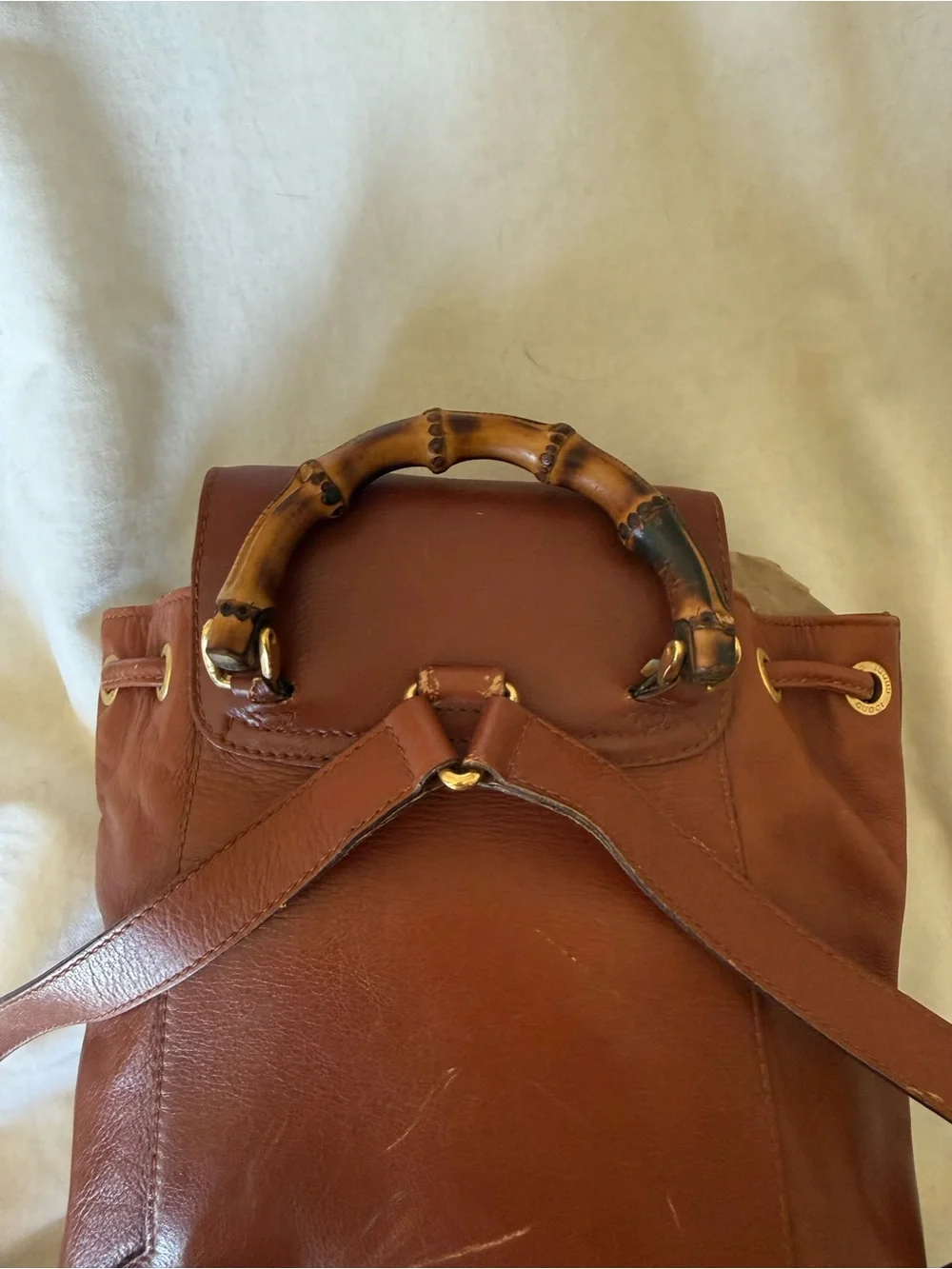 GUCCI leather backpack with gold and bamboo handle